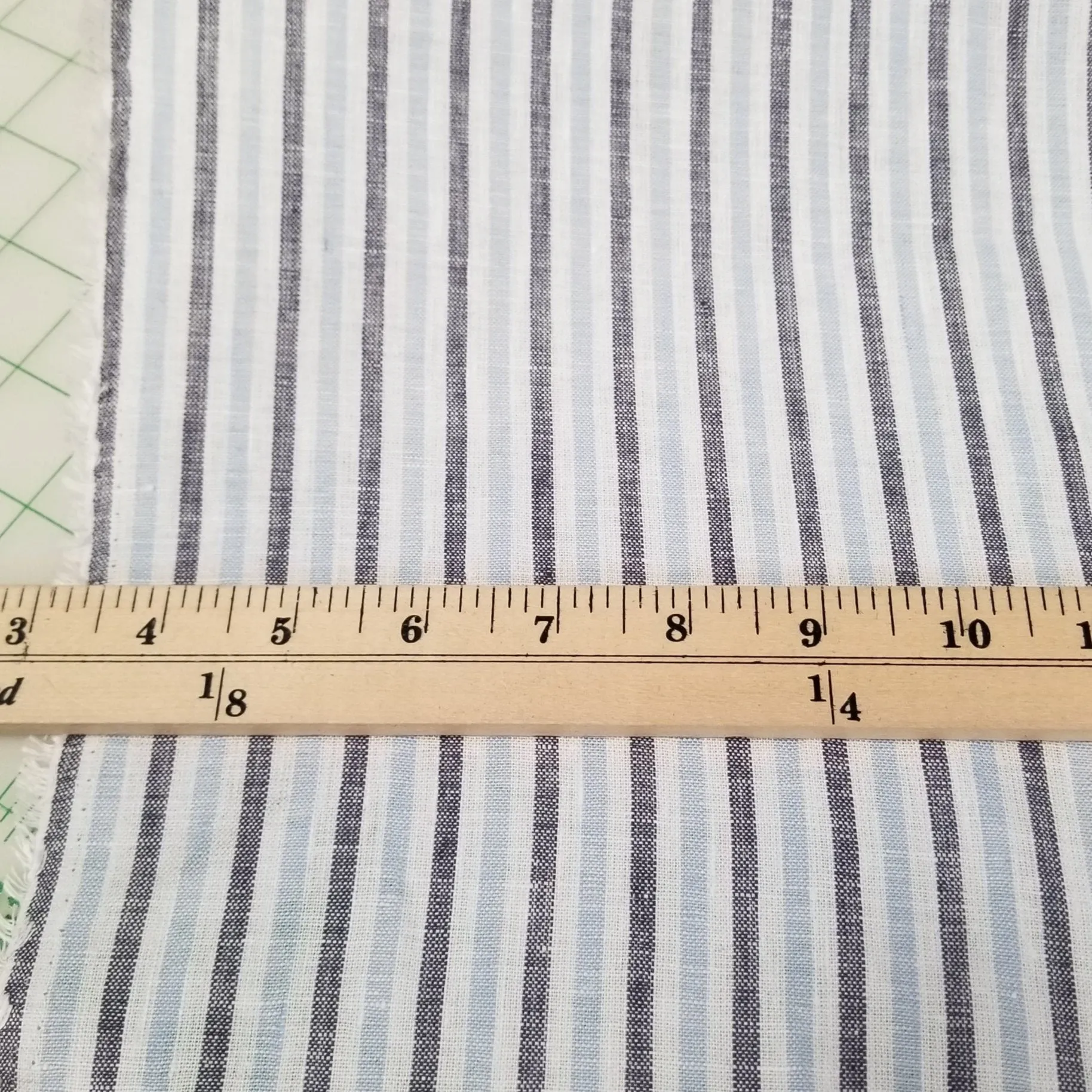 End of bolt: 2-5/8th yards of Irish Linen White and Baby Blue Vertical Stripe Spence Bryson Woven 150GSM-remnant