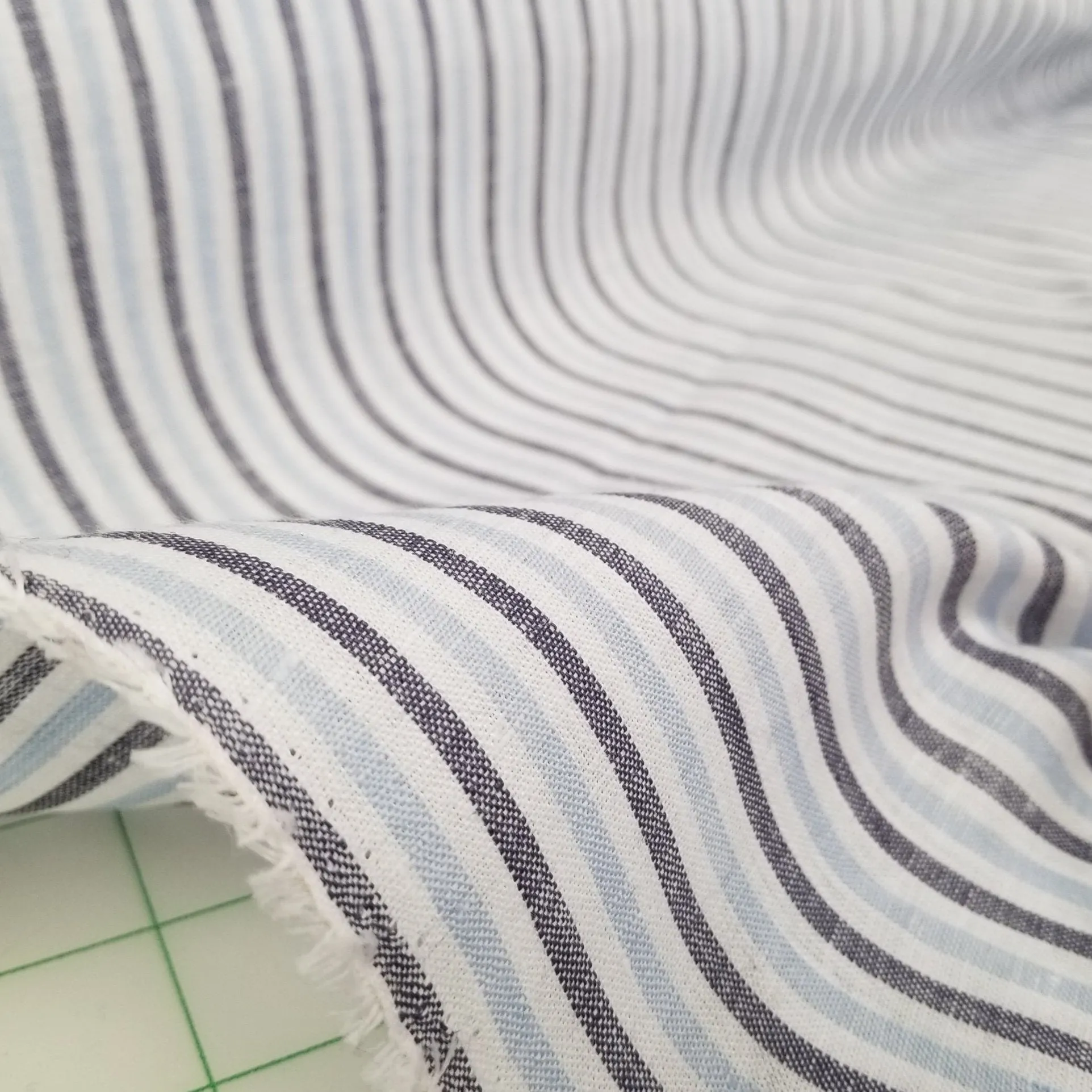 End of bolt: 2-5/8th yards of Irish Linen White and Baby Blue Vertical Stripe Spence Bryson Woven 150GSM-remnant